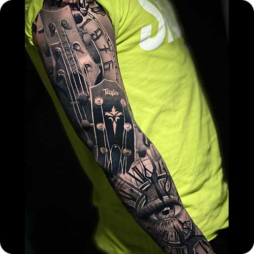 Amazing Guitar Sleeve Tattoo