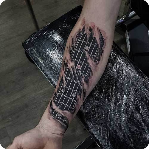 Guitar Fretboard Skin Rip Tattoo