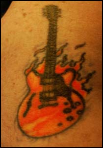 Gibson Guitar Tattoo on Fire