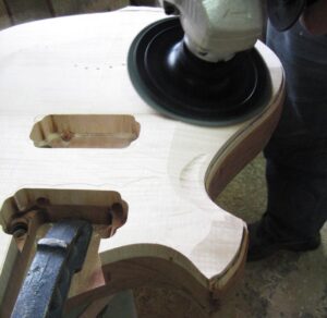 Sanding the guitar body contours