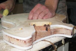 A view of the full guitar body with binding completed