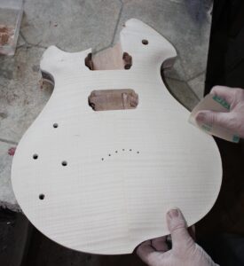 Left handed custom guitar begins to appear!