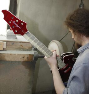 Final buffing of the guitar