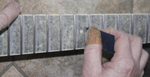 Cleaning up the guitar frets