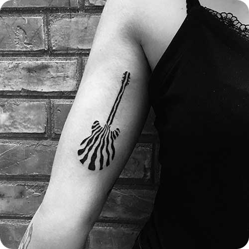 Womens Guitar Tattoo